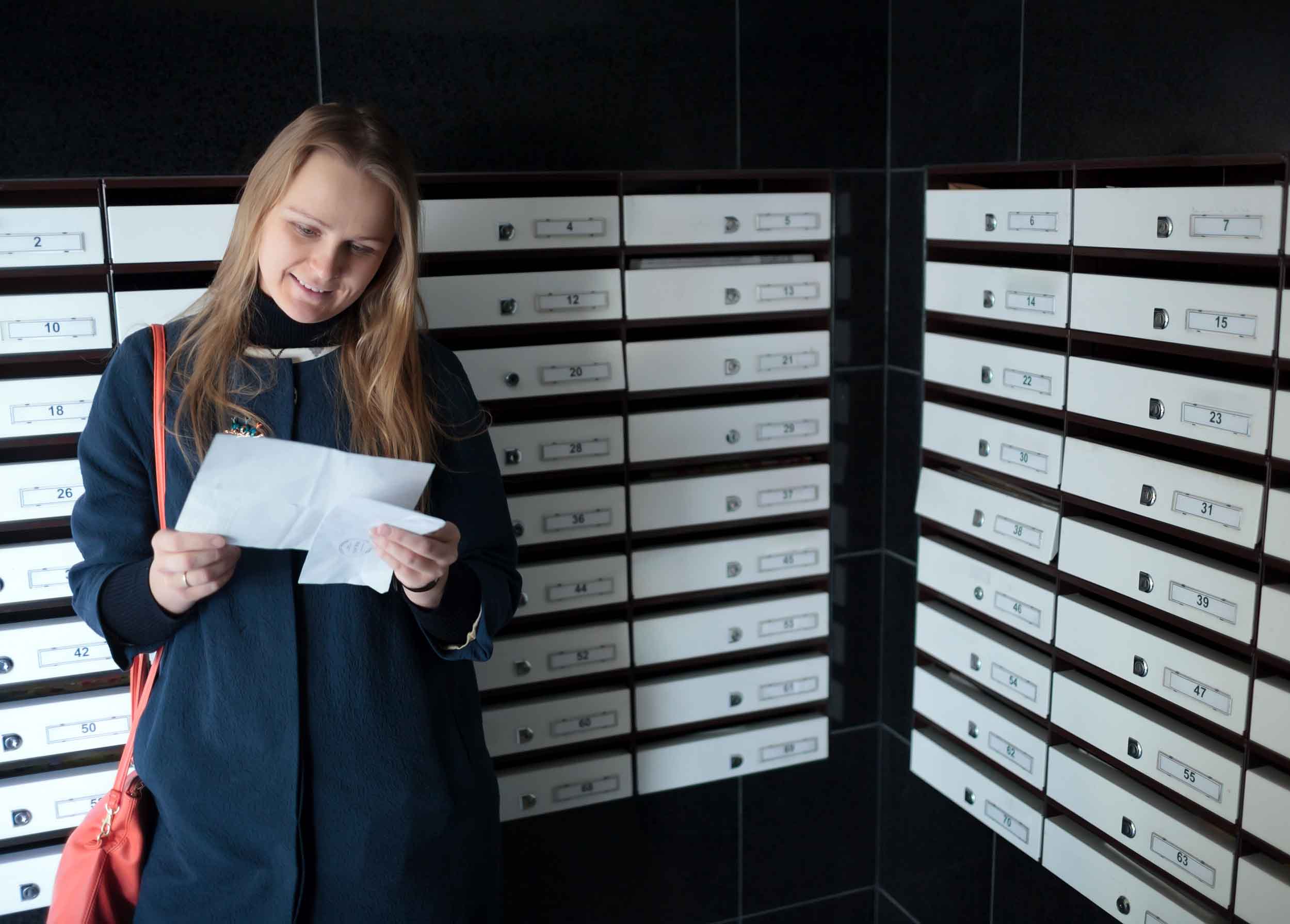 woman reading a letter